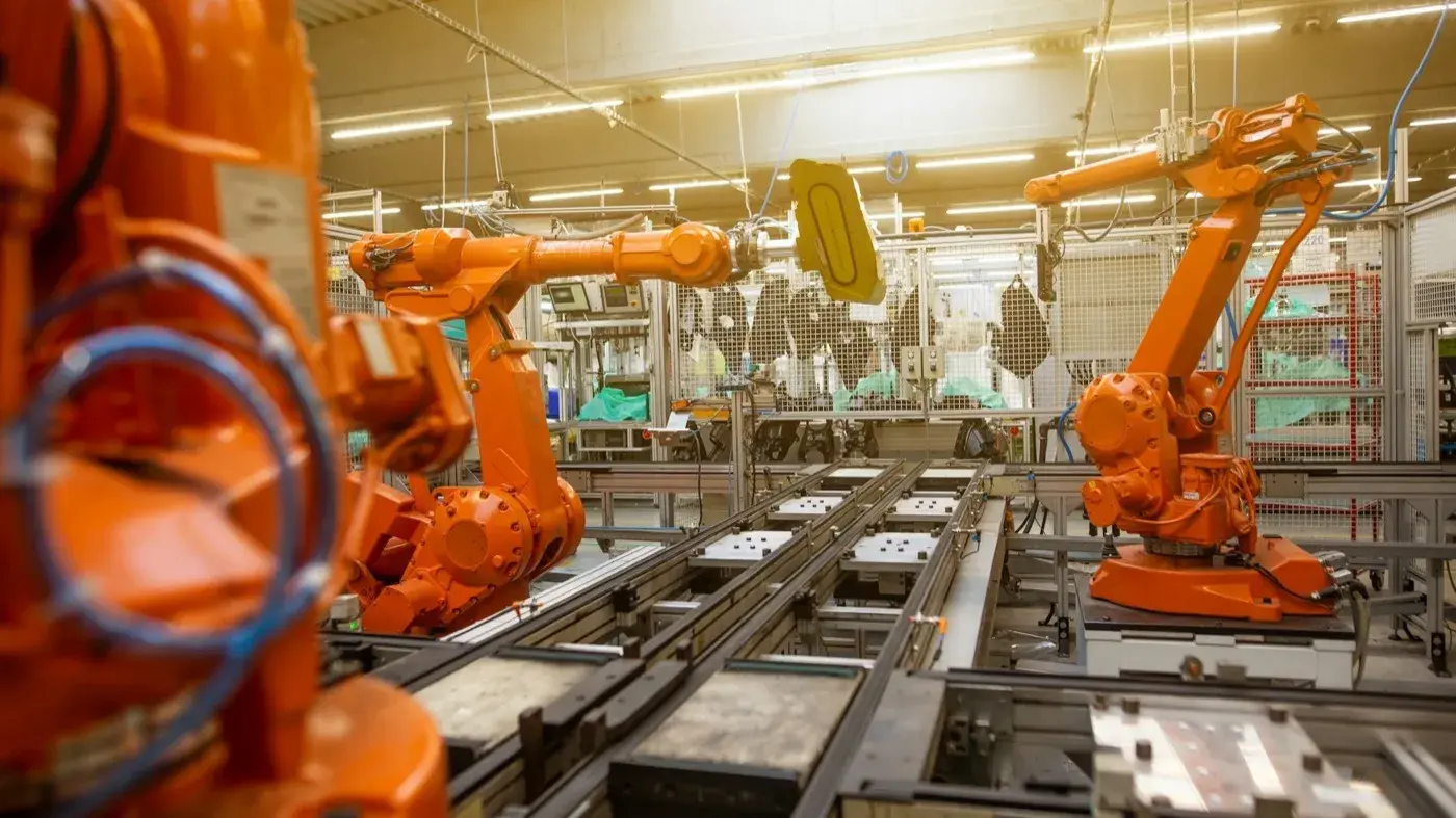 Modern automation at work on an industrial production line, in HarborWind navy duotone