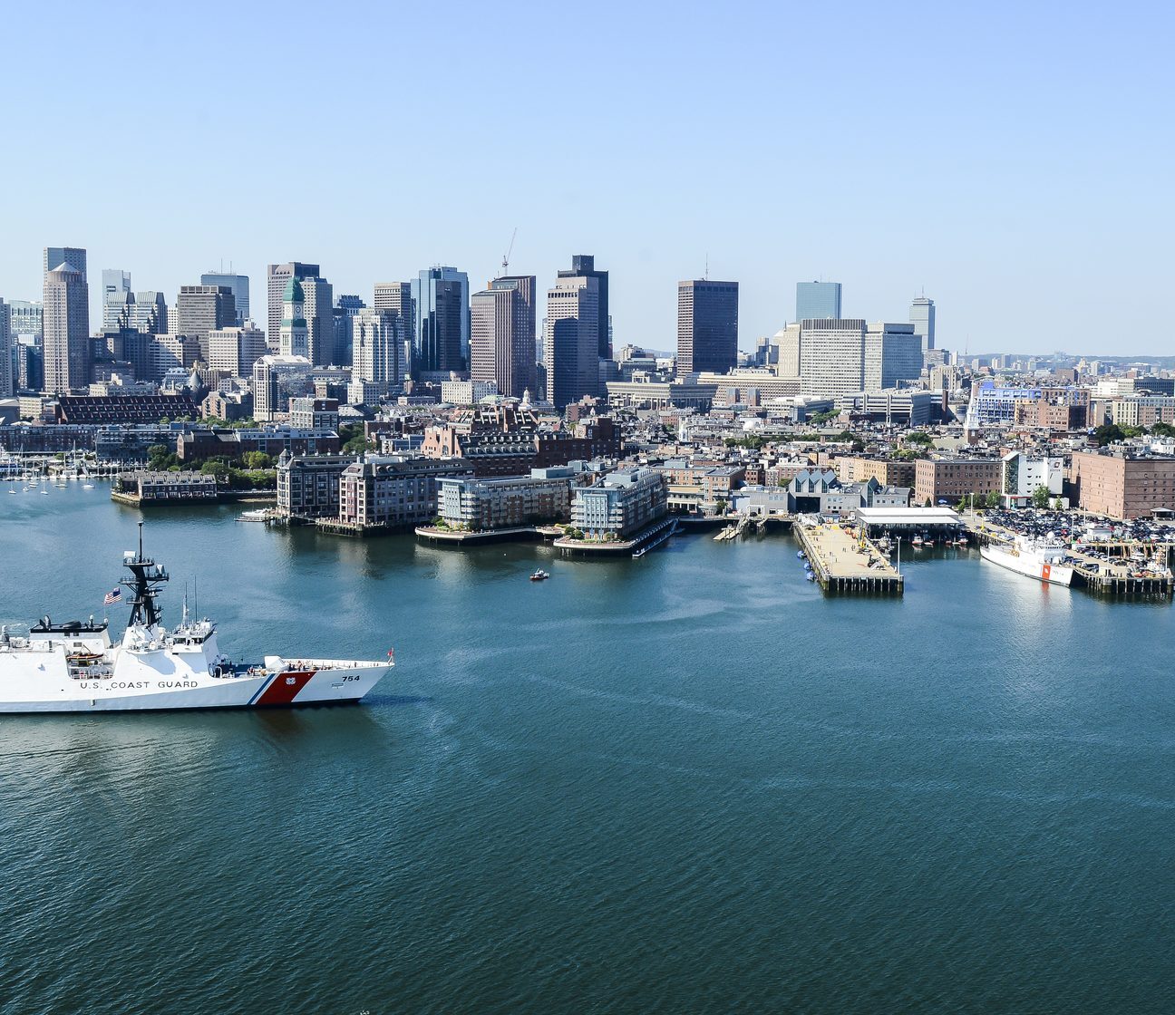 Boston Harbor skyline with Coast Guard vessel